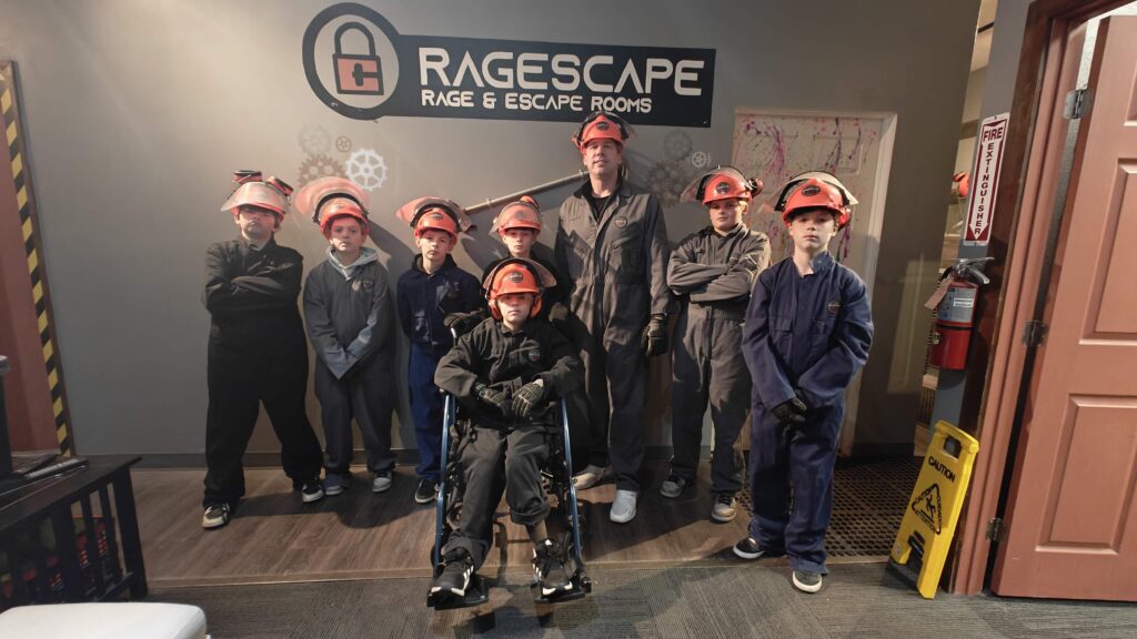 Corporate team photo after rage room session RageScape