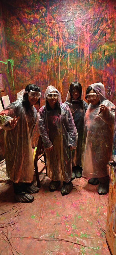Friends group photo paint splatter room RageScape San Diego