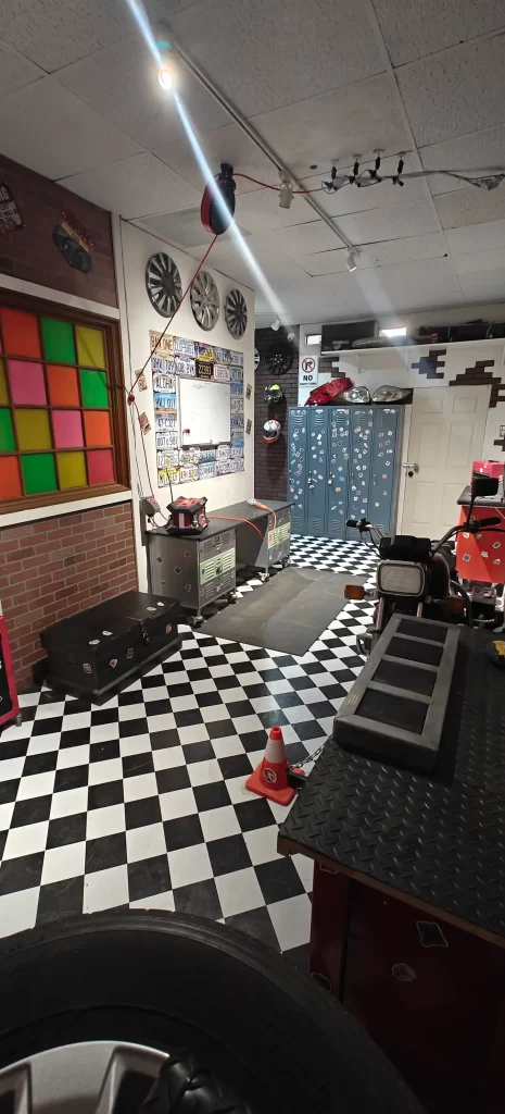 Escape room set design motorcycle and tools at RageScape Oceanside CA