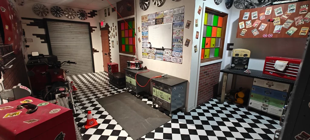 The Chopshop escape room interior garage workshop at RageScape Oceanside